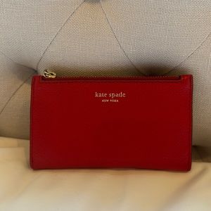 Kate Spade red embossed leather small slim bifold wallet